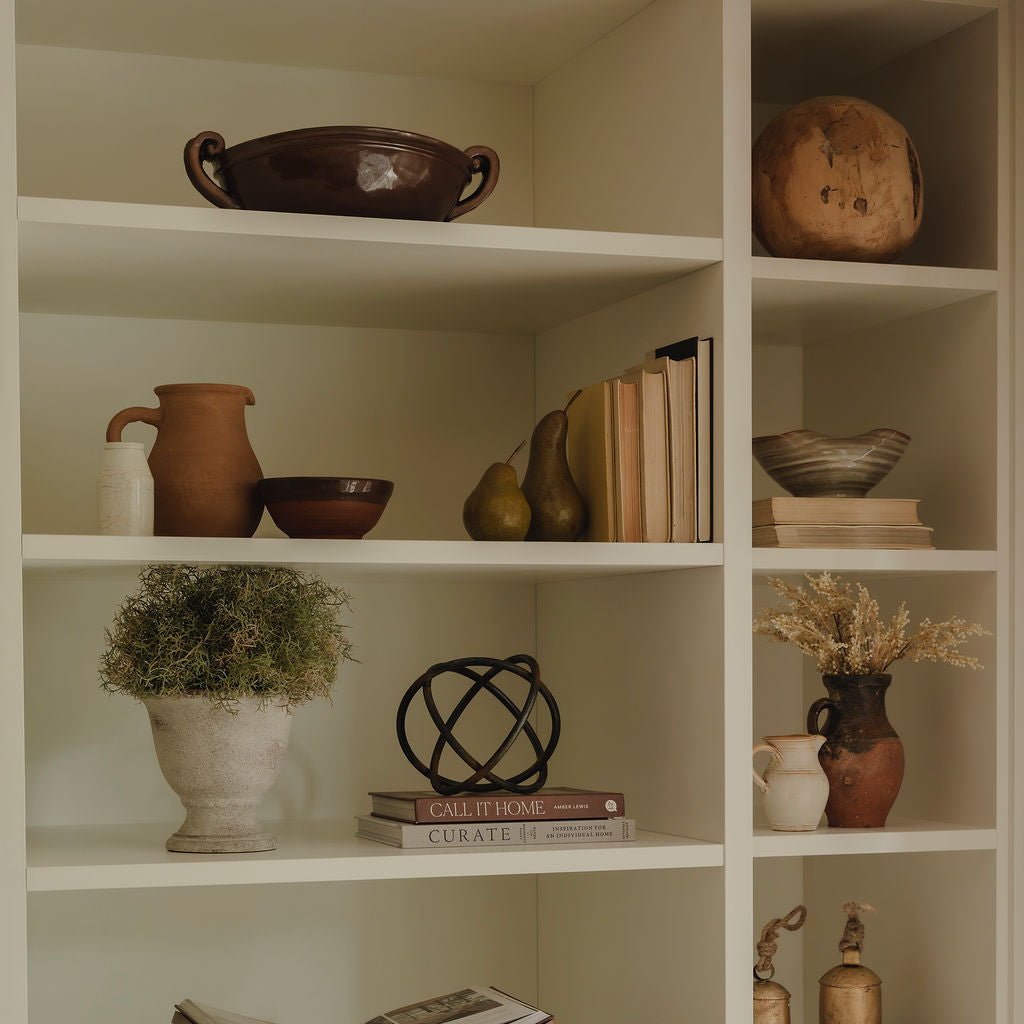 Chestnut stoneware bowl styled on open shelving with rustic decor