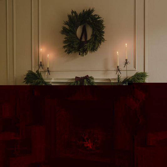 Faux Cedar Wreath styled with cowbells and velvet ribbon for Christmas